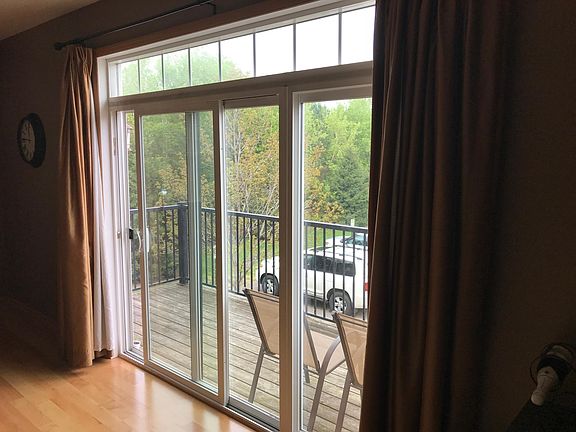 Sliding glass door onto deck from kitchen
