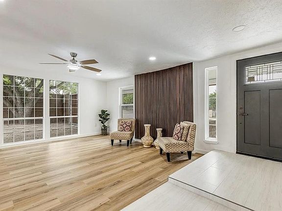 Foyer featuring light wood-style floors, recessed lighting, and a ceiling fan