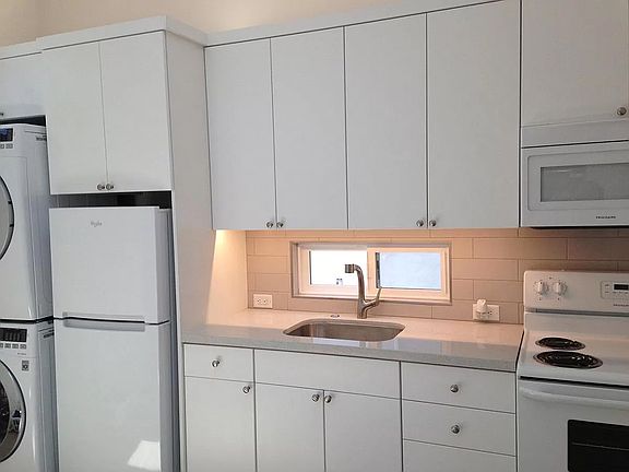 kitchen with up and down lighting