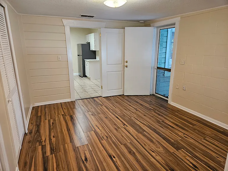 Bedroom with private entrance from covered parking