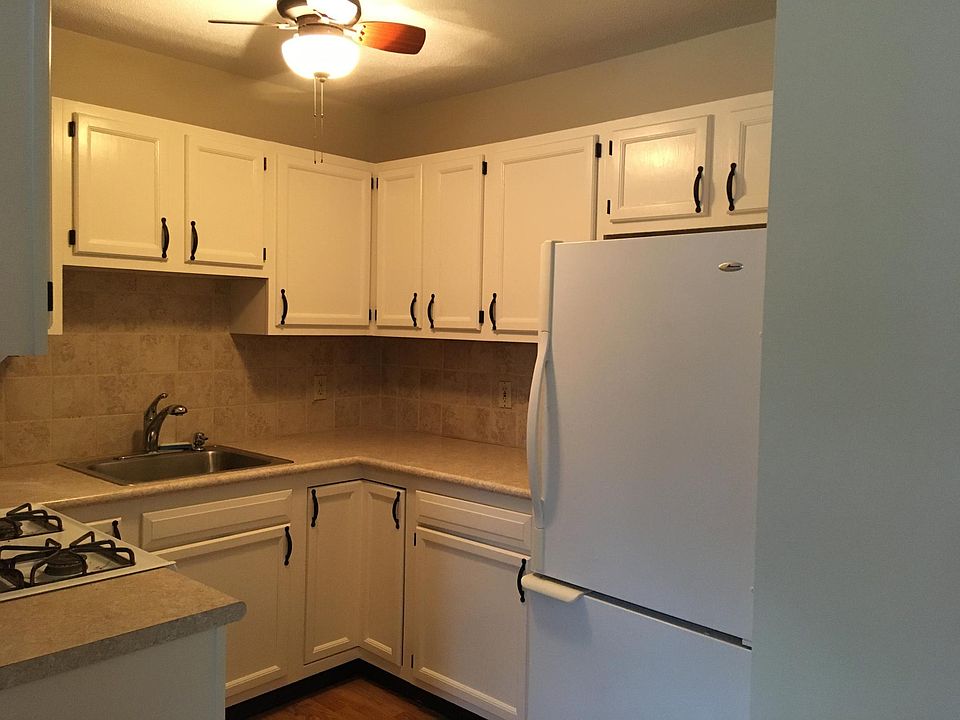 Kitchen, newly painted cabinets. Gas stove.