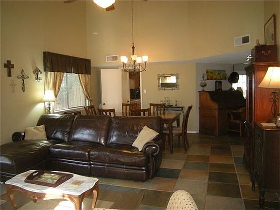 Living &b dining area with vaulted ceiling