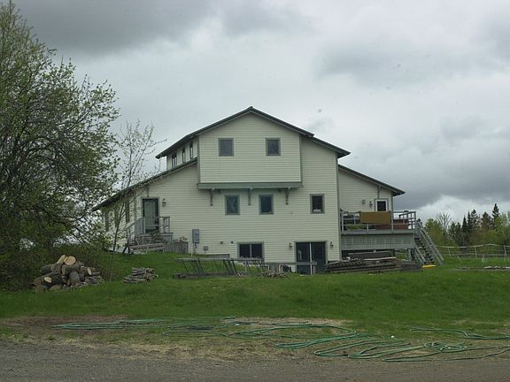 The upstairs apt has a great view of the entire farm and bar