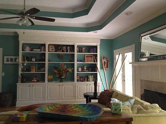 Another view the oversized family room shows the the fantastic built ins for showcasing family memories.