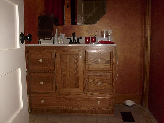 custom oak cabinet with lots of storage
