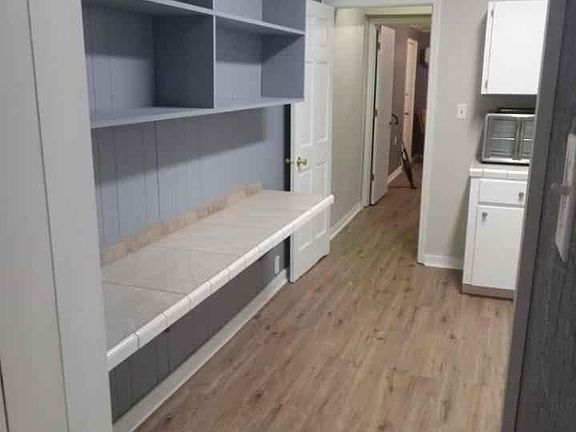 Left side of kitchen with eat at bar