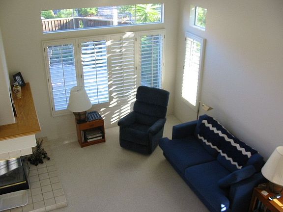 Light and bright living with vaulted ceiling.