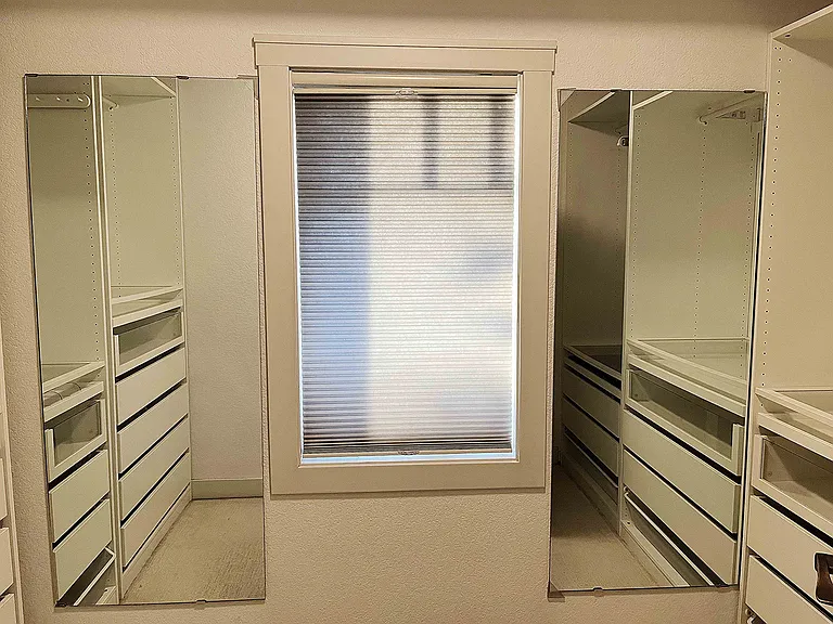 Master Closet with His/hers vanity mirrors