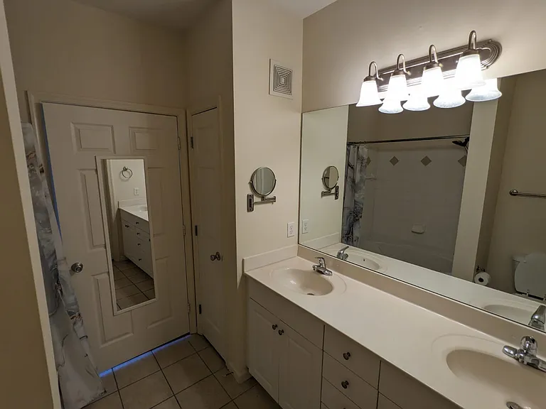 Second bathroom with linen closet