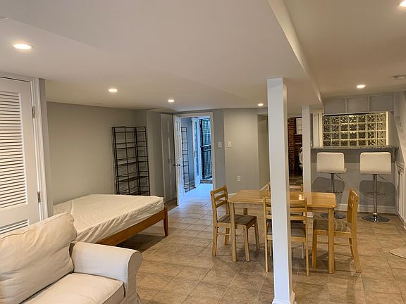 Partly-furnished apartment, looking toward the back