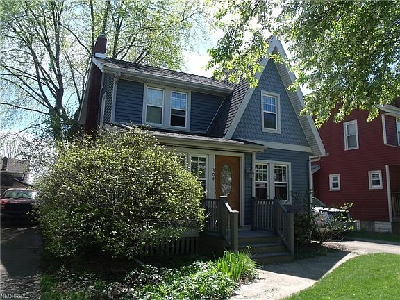 Loads of perennials greet you in the front of this charming home!  There is a pretty walkway across the entire front leading up to the composite porch and leaded glass front door!