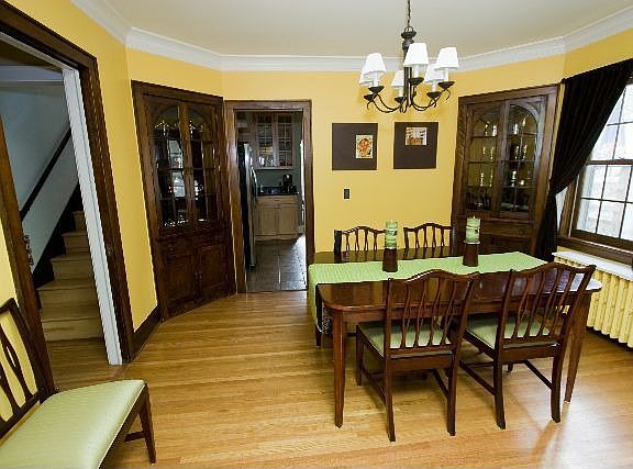 Dining Room, built ins, natural woodwork, gorgeous fixtures!