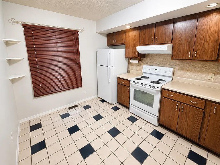 Kitchen -
Updated kitchen with ample cabinet space and a functional layout designed for everyday living.