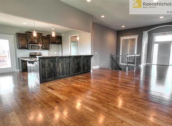 Wood floors flow through out the common areas on the first floor