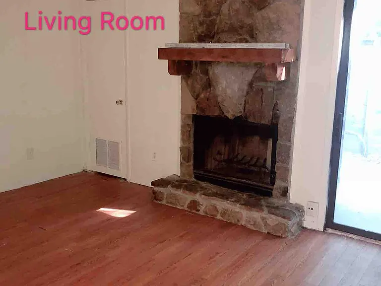 Living Room With a huge closet and fireplace