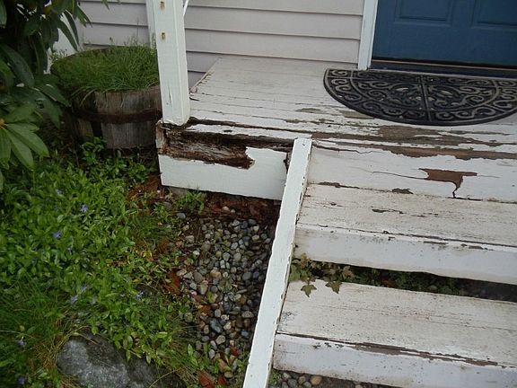 Front porch that needs repair.