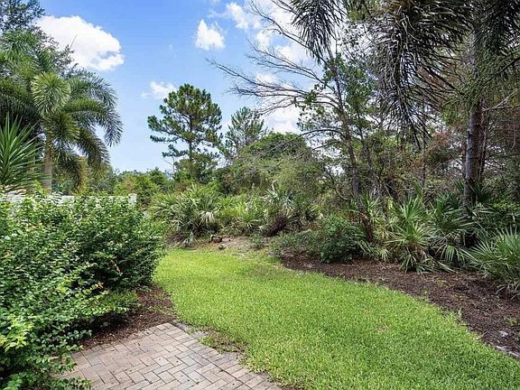 Backyard - a preserve with paths explore, water access, dock to fish off.