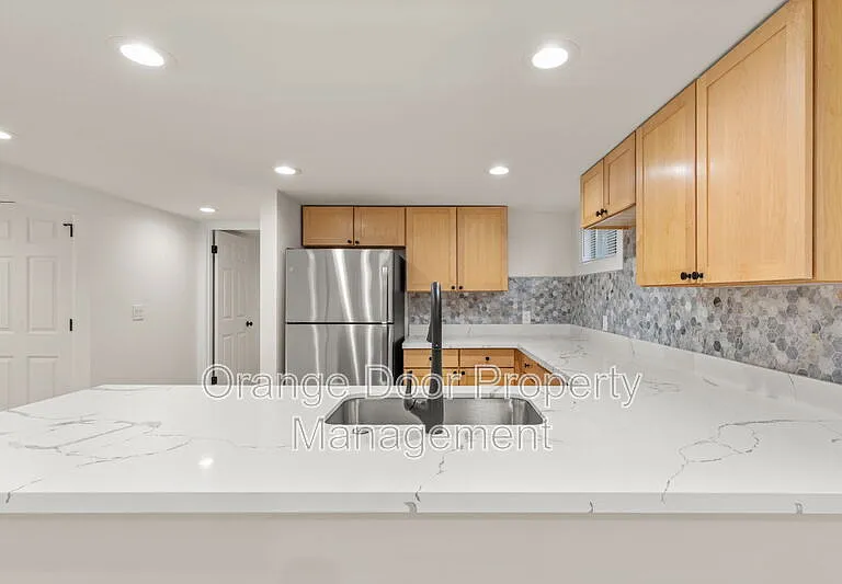7727 Jones Ave NW — Photo 13