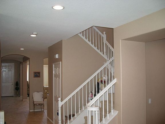 Second Floor Stairs off Kitchen