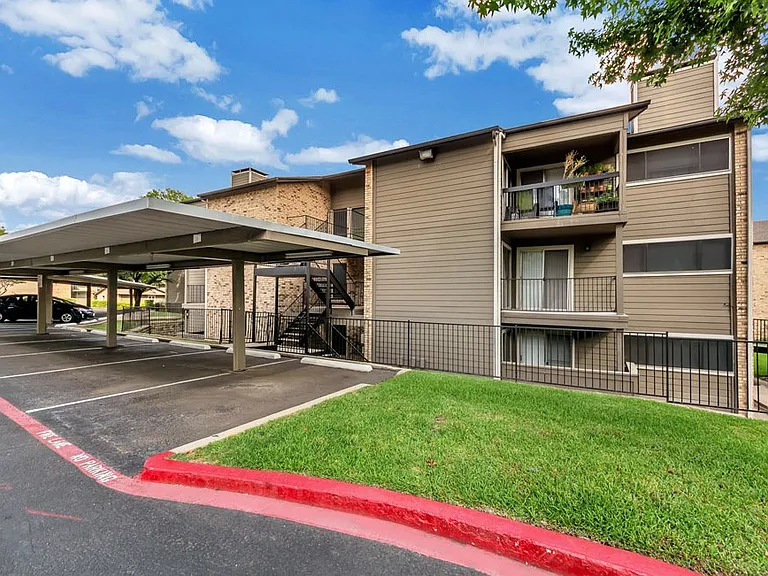 Convenient resident parking and beautifully maintained community grounds