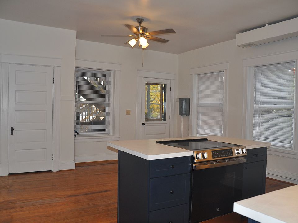Kitchen and rear door to porch and yard