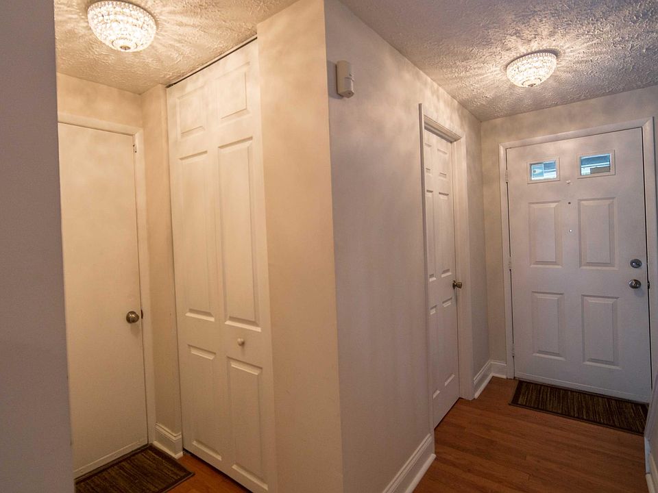 Front door and garage entrance, coat closet to left.