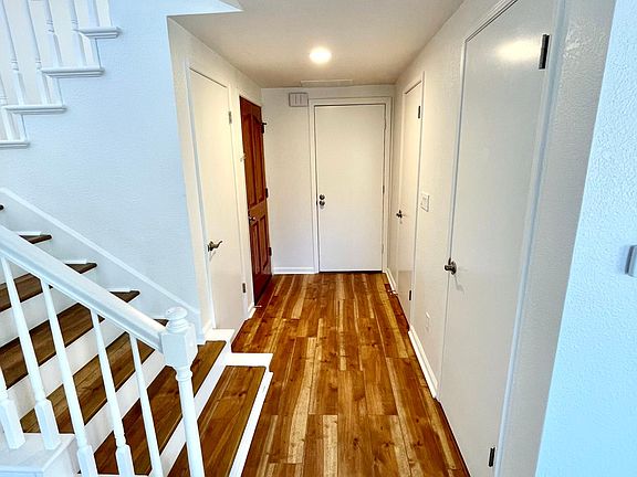 Downstairs entry with 1/2 bath, 2 closets, & direct garage access.