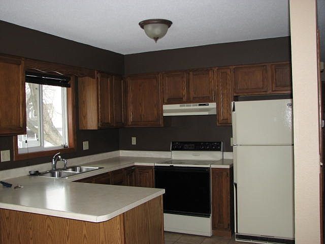 Main floor kitchen with breakfast bar