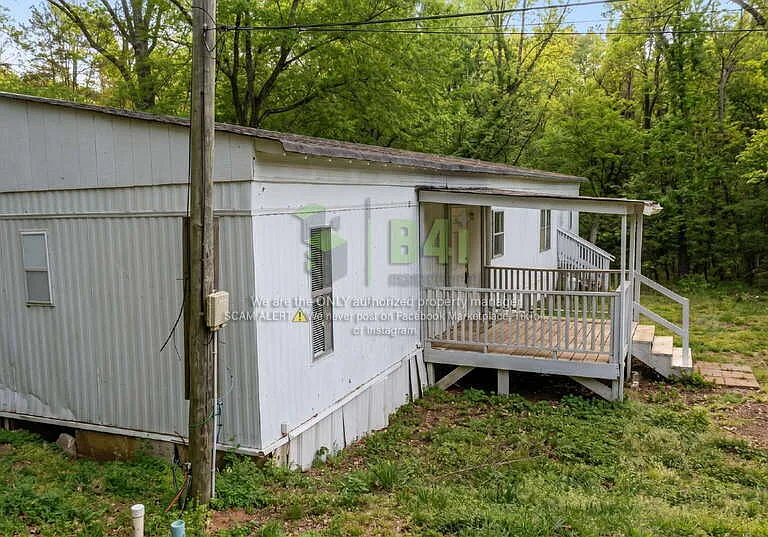 122 Collins Rd — Photo 3