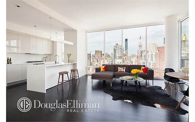 Sold by Douglas Elliman | media 18
