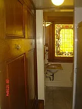 stained glass window in bathroom