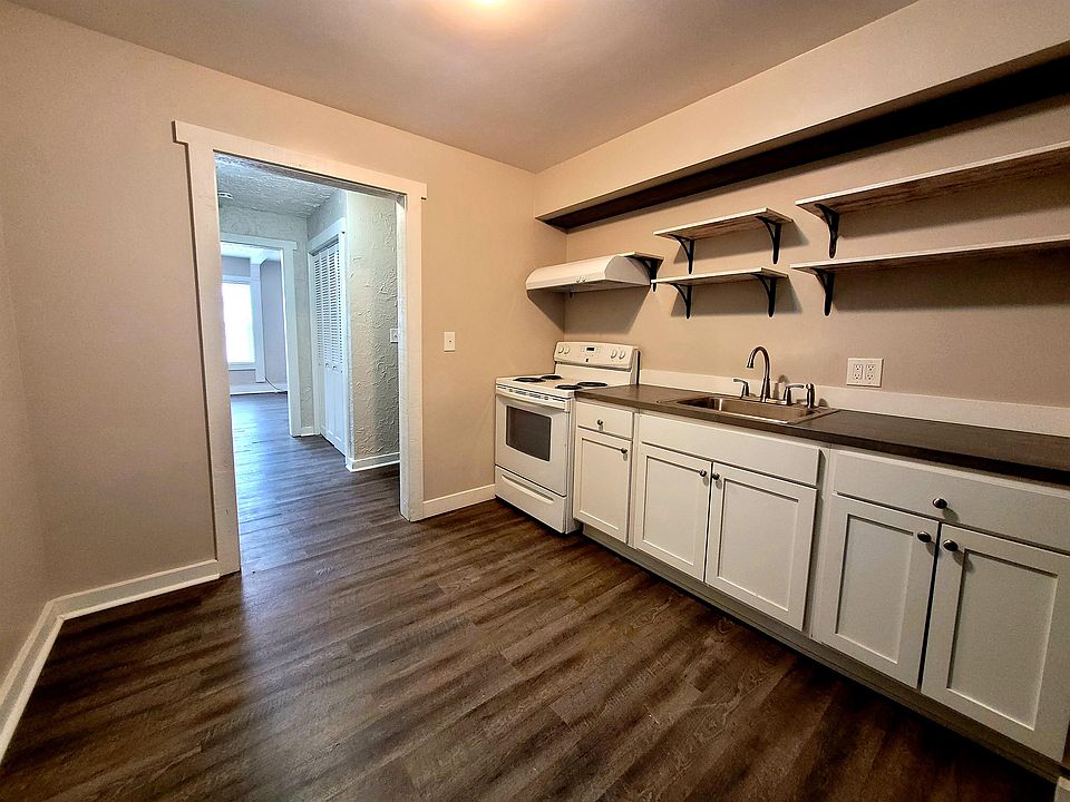 Kitchen with open shelving.