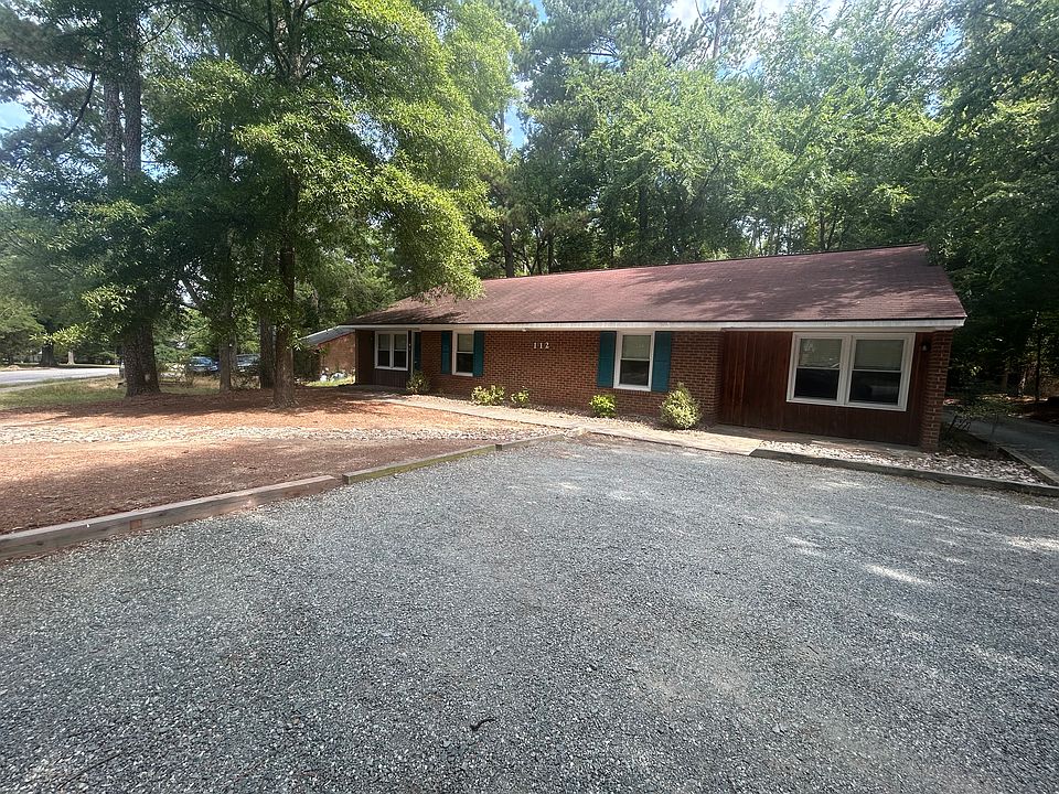 Front of house with parking up to 4 vehicles