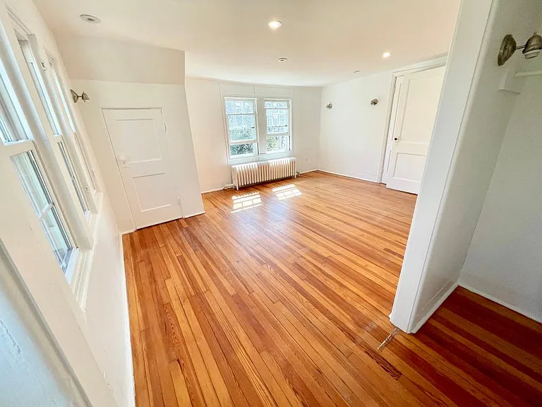 Master bedroom has 6 windows, 3 closets and beautiful woodland views.