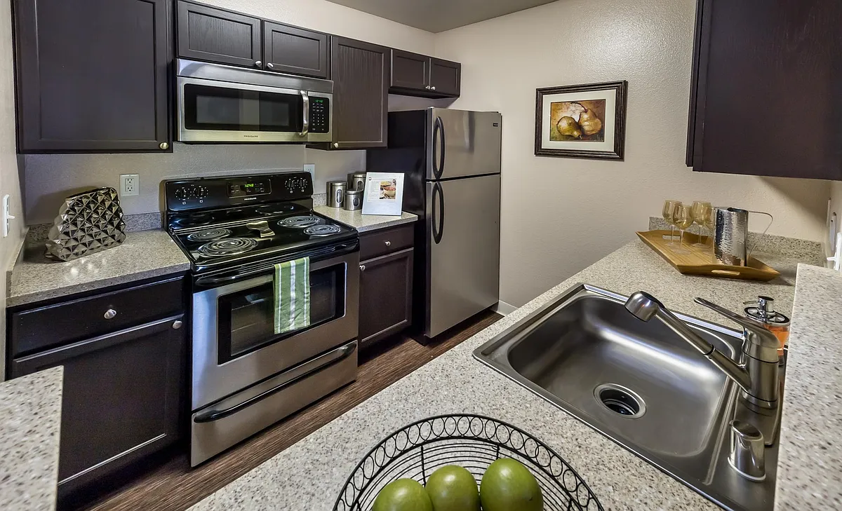 Quartz countertops, luxury wood style flooring, stainless steel appliances, washer and dryer in every home, private balconies, oversized closets, lagoon waterfront views *select units - Bridges at San Ramon