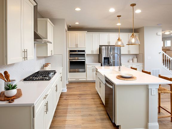 Kitchen with Center Island and Built-in Appliances