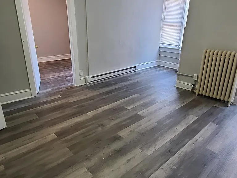 Spacious living room area overseeing downtown Bethlehem with access to 1st bedroom