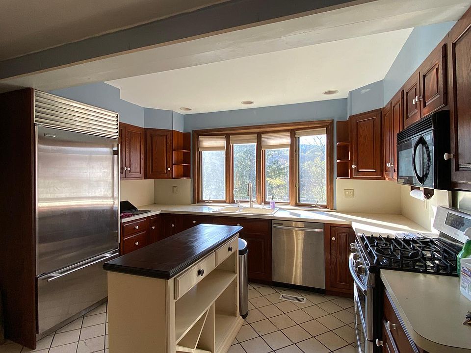 Large eat-in kitchen; Subzero fridge; new double range stove oven and dishwasher