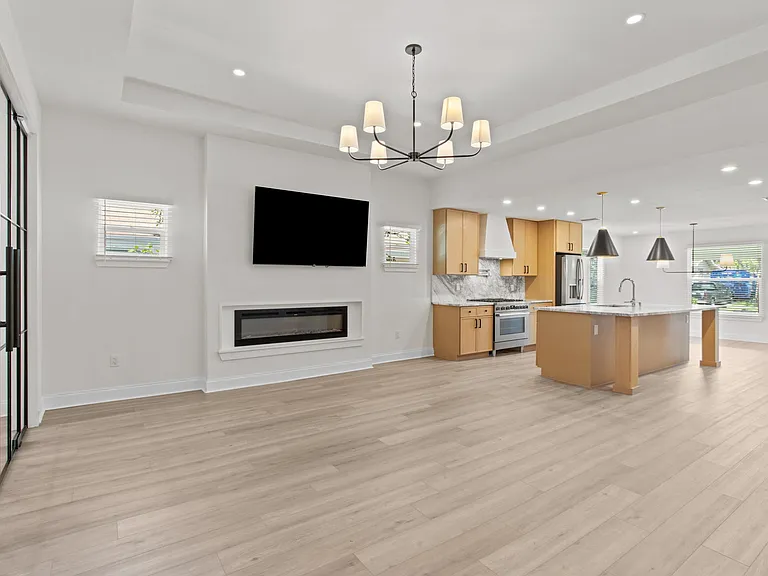 Living room, TV, fireplace, kitchen