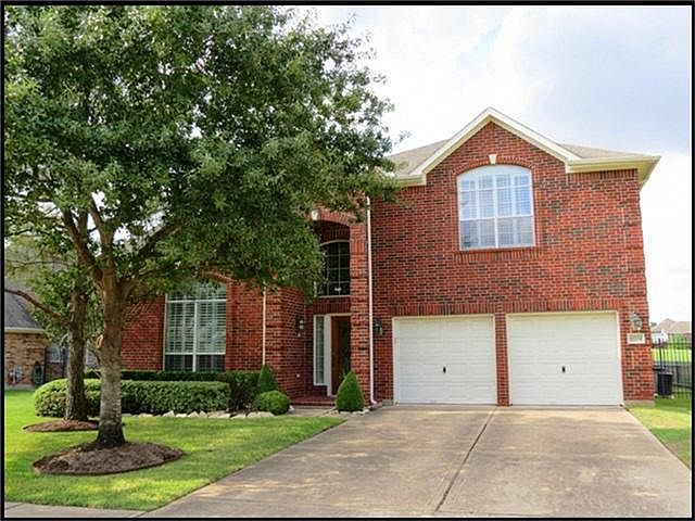 Executive home on golf course in gated community.