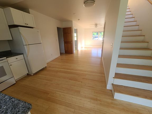 1st floor with stairs going up to master bedroom (all bamboo floors have been refinished)