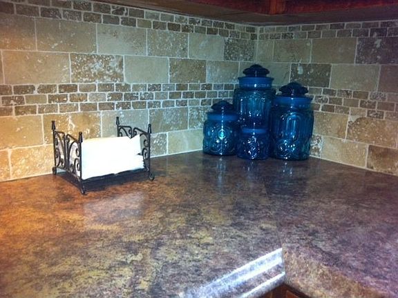 Upgraded travertine tile