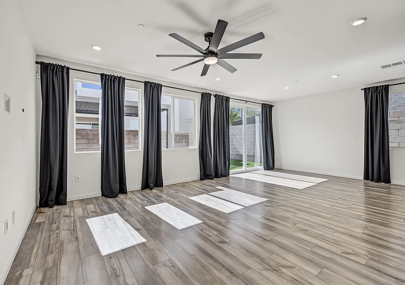 5-Bedroom Home for Rent in Gated Kyle Canyon Community | Downstairs Bedroom | Modern Kitchen — Photo 4