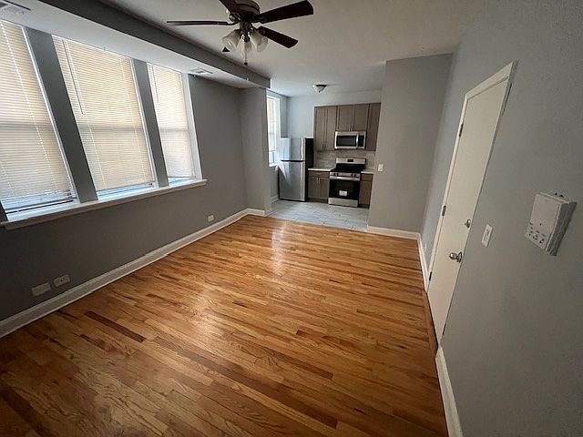 Living room and entry. Kitchen at rear.