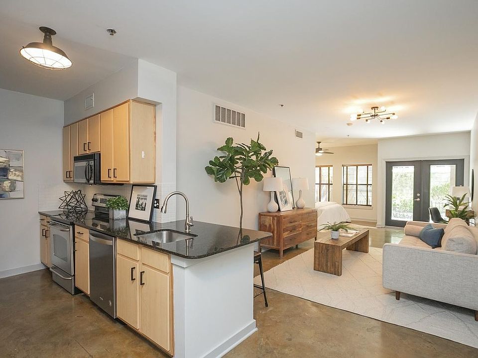 Living room and kitchen (furniture for illustration)