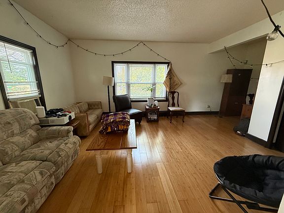 Spacious living room with hardwood floors