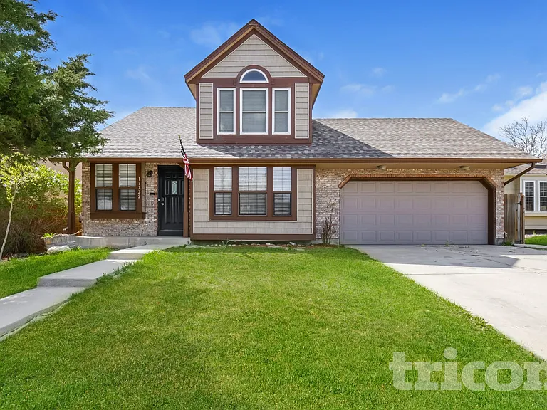 13722 W 64th Dr — Photo 1