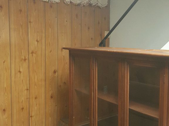 curio cabinet in basement