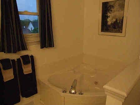 Jacuzzi in large bathroom