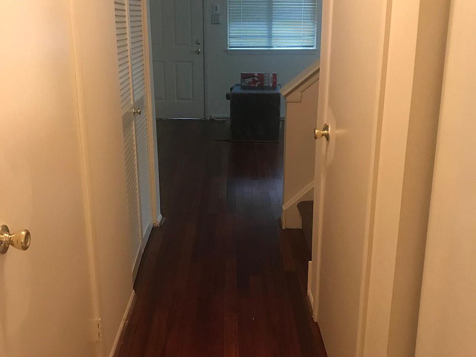 Hallway facing the living room and front door